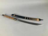 two swords with wooden handles on a white surface