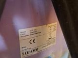 a close up of a machine with a label on it