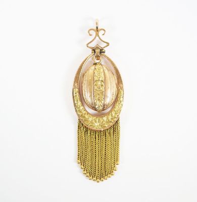 a close up of a gold necklace on a white background