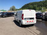 a white van that is parked in a parking lot