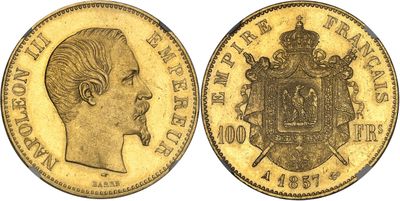 a gold sovereign coin with the head of a woman and a coat of arms