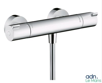 a close up of a shower faucet on a pole on a white background