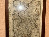 a picture of a map hanging on the wall