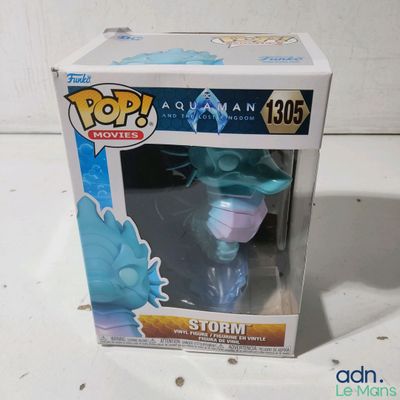 un gros plan d'une figurine Pop Vinyl dans sa boîte