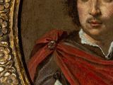 portrait of a young man in a red cloak by a gold frame