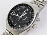 a close up of a wrist watch on a white surface