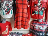 a display of ugly sweaters on display in a store