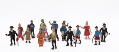 toy figurines of a group of people dressed in different outfits