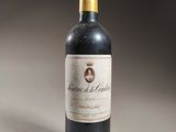 a bottle of wine that is sitting on a table