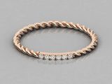 a rose gold ring with diamonds