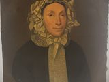 portrait of a woman in a black dress and a yellow scarf