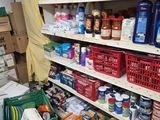a large amount of food on the shelves in the store