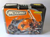 a metal box with a lego set inside of it