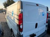 a white van that is parked in a parking lot