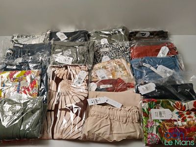 many different types of clothing on display in a box