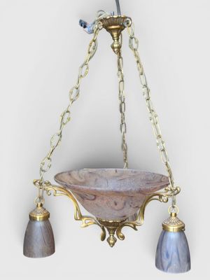 an image of a chandelier with a bird on top of it