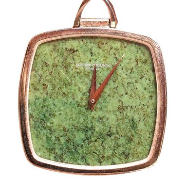 a green square watch with a red hands on a white background