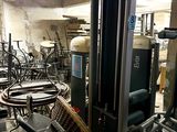 many machines that are sitting in a room