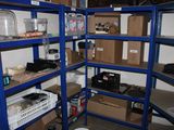 a room with a lot of shelves and boxes on the shelves