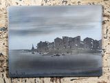 a picture of a painting of a castle on the water