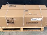 a large cardboard box sitting on a pallet in a warehouse