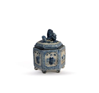 blue and white porcelain box with a lion on top of it