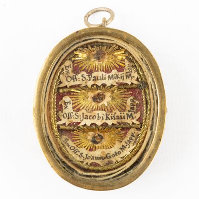 an image of a gold locke with a picture of a sun on it