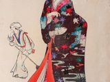an image of a woman in a kimono is holding a doll