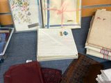 a table with many different types of cloths on it