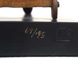 a black box with a clock on top of it