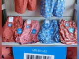 a display of underwear on a shelf in a store