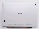 a close up of the back of a white laptop computer
