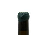 a bottle of wine that is sitting on a table