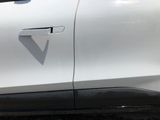 a close up of a car door with the number 7 painted on it