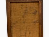 an old wooden picture frame with a piece of paper in it