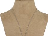 a close up of a necklace on a mannequin torso