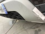 a sticker on the front of a car that has a sticker on it