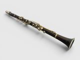 a close up of a clarinet on a white background