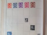 a book with stamps on it on a table
