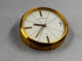 a clock that is sitting on a table