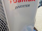 a picture of a toshiba inverter sitting on a box