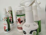 a bottle of insect repellent next to several bottles of insect repellent