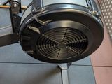 a rowing machine that is sitting on the floor