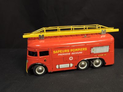 a toy fire truck with a ladder on top of it