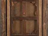 an old wooden frame with a window in the middle of it