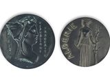 an image of a coin with the image of a woman on it