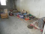 a room with a lot of boxes and crates on the floor