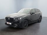 un SUV Mazda CX-HR gris garé dans une pièce