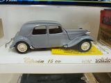 a toy car that is on display on a shelf