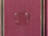 an old book with a picture of a cat in a frame